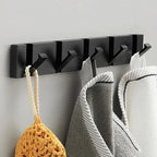 Wall Hook Rail — Black & Gold, Foldable in lifestyle setting