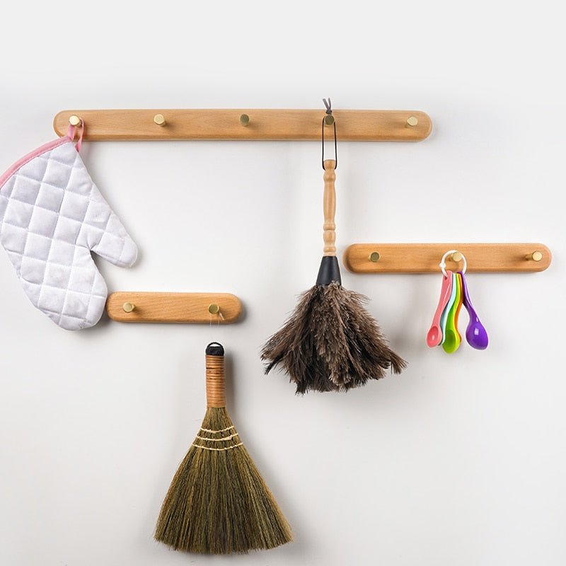 Wall Coat Rack — Walnut & Beech Wood, Brass Hooks in lifestyle setting