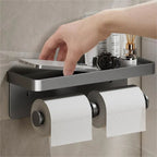 Wall-mount toilet paper holder with phone shelf aluminium silver finish in modern bathroom