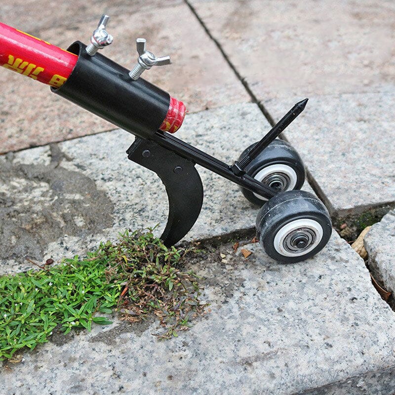 Manual grass trimmer with curved blade and wheels removing weeds between concrete pavement cracks