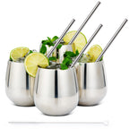 Stainless steel tumblers 4-pack with straws lime mint cocktails white background