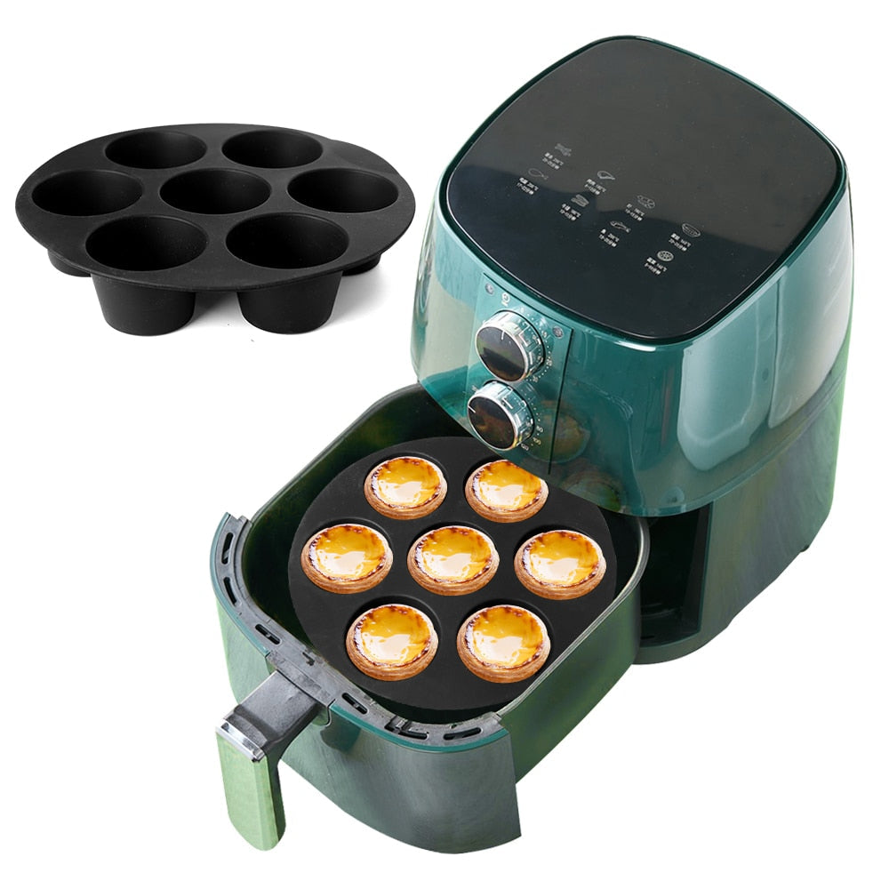Black silicone 7-cup muffin mould for air fryer front view on white background showing round cup cavities