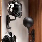Wall-mount motorcycle helmet holder matte black swivel arm rounded ball cradle full-face helmet mounted on grey wall