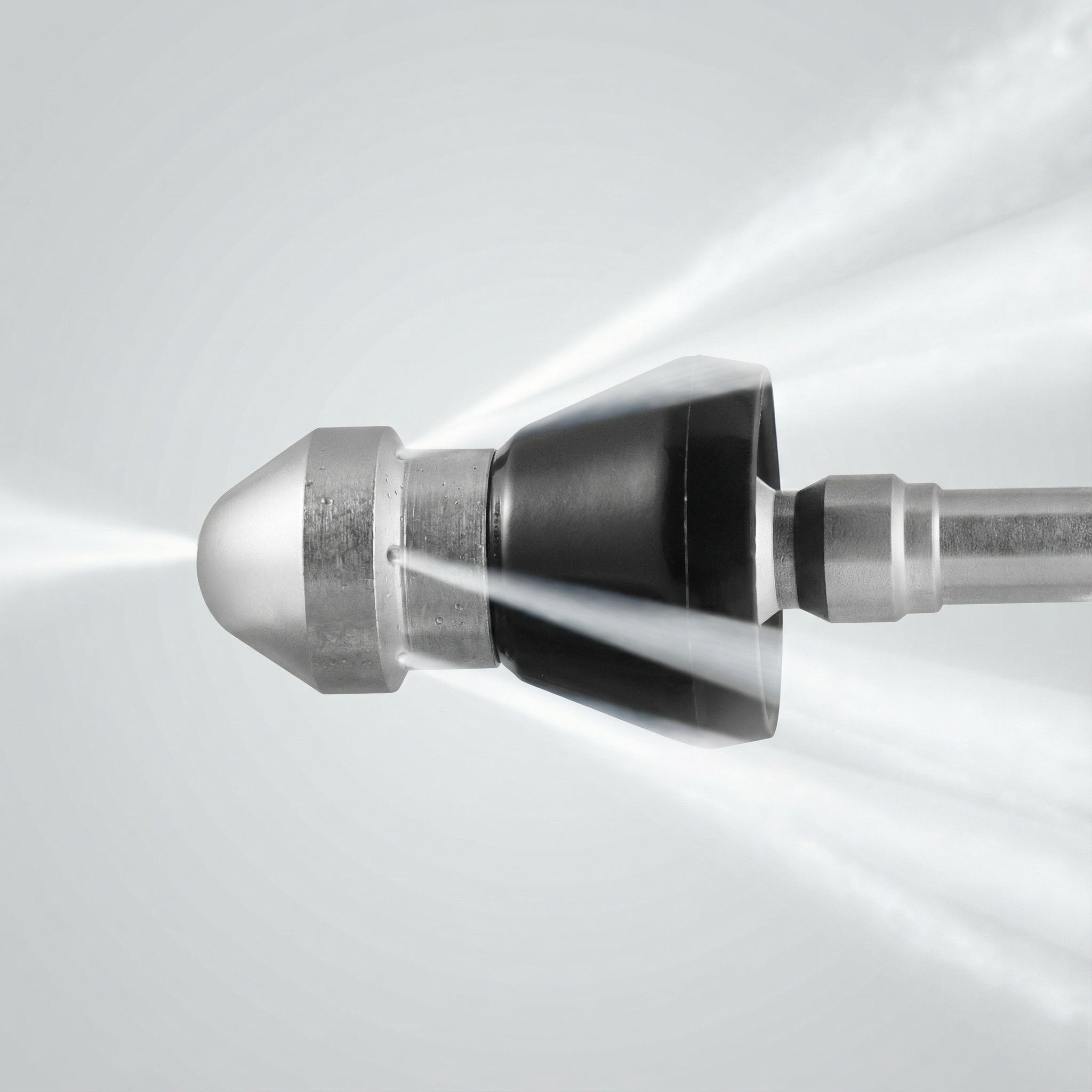High-pressure stainless steel drain cleaning nozzle on white background, front view showing spray tip and body
