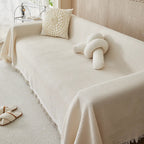 Beige breathable sofa cover on modern three-seater lounge in Australian living room