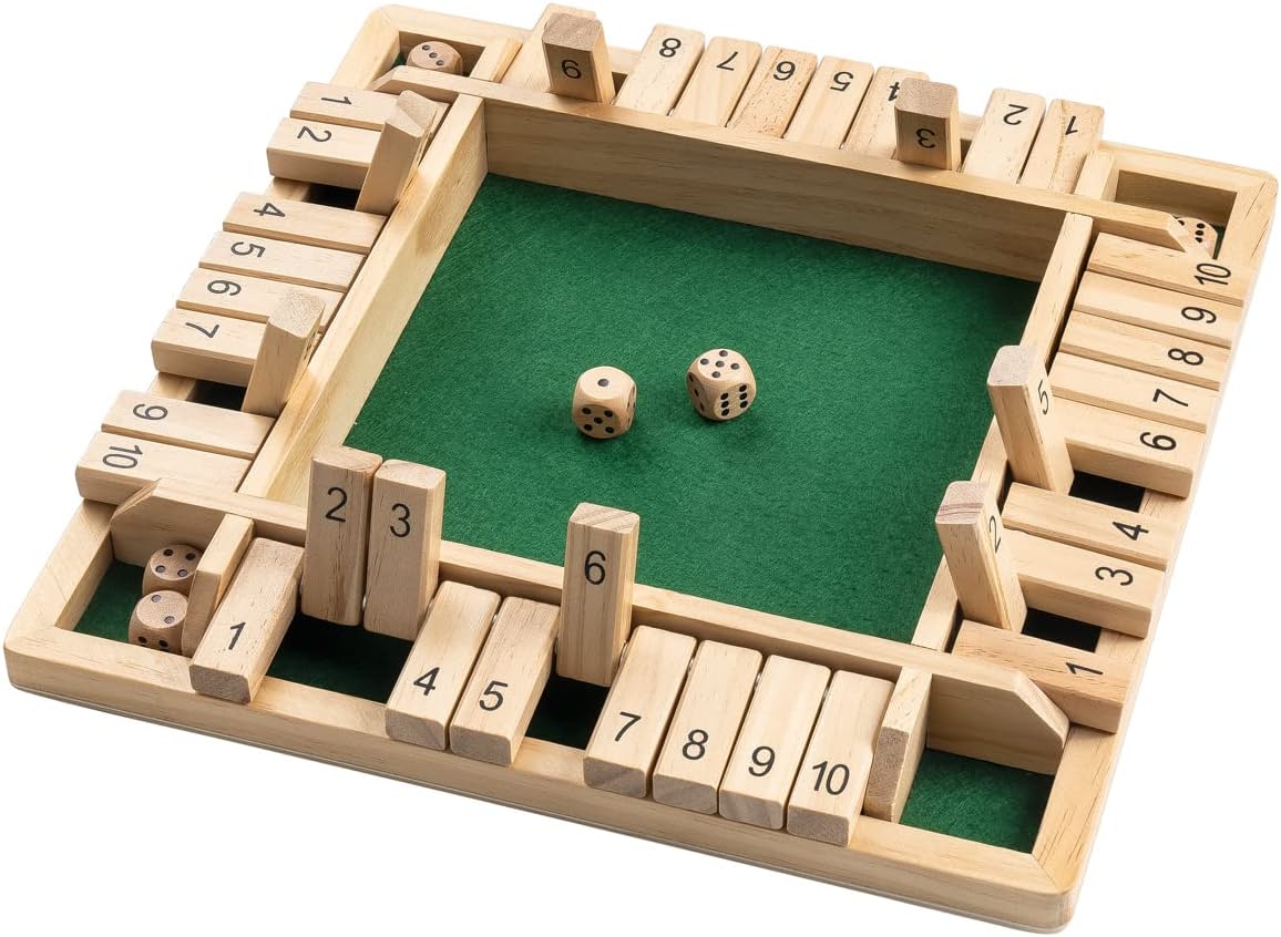 Shut the Box wooden 4-player dice board game overhead view showing numbered flip tiles and green felt centre on white background