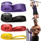 Four-piece TPE resistance band set in yellow, red, black, and purple on white background showing all four resistance levels