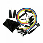 11-piece resistance band set laid flat on white background showing all tubes handles ankle straps and carry bag