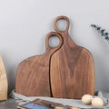 Walnut wood chopping board double-sided 35cm handcrafted natural grain on white background
