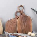 Walnut wood chopping board double-sided 35cm handcrafted natural grain on white background