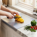 Stainless steel cutting board 40x30cm with non-slip grip edge polished finish white background