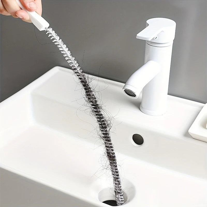 Single flexible plastic drain cleaning brush white handle full length 45 cm on white background