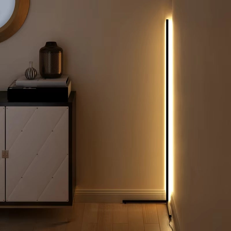 Dimmable corner floor lamp LED black finish on white background studio product photography