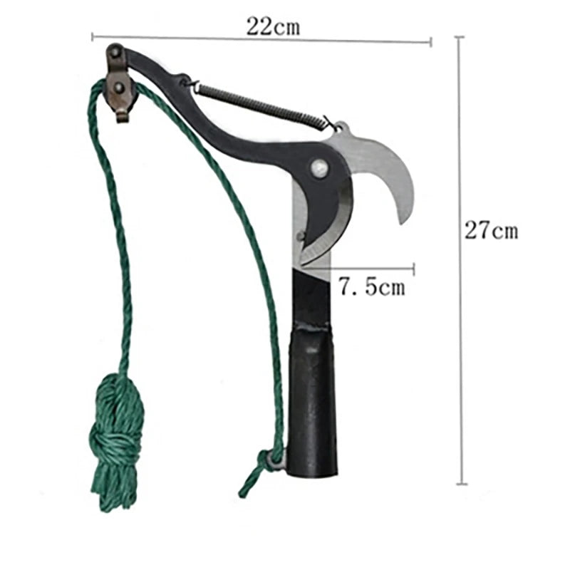 Black rope branch pruner held upward toward leafy tree branches in an Australian backyard garden setting