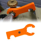 Gas cylinder wrench in orange black and white three colour variants laid flat on white background