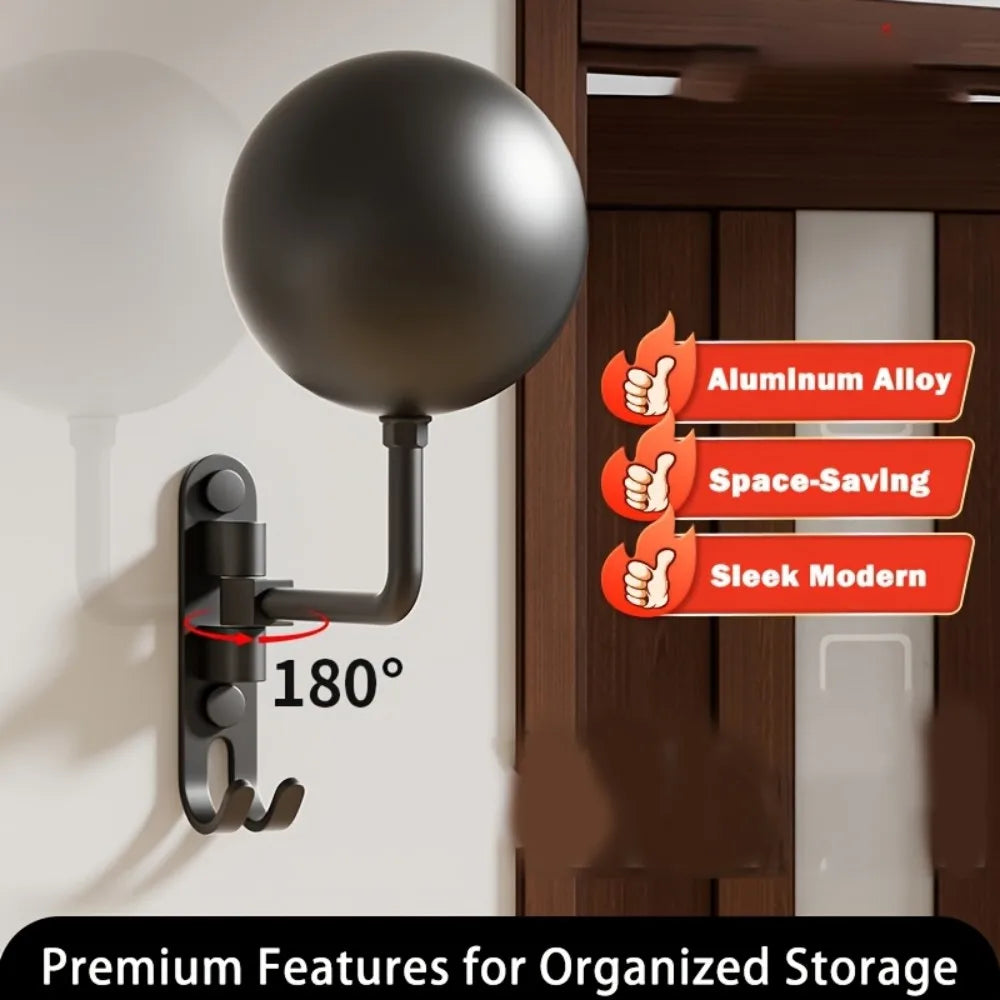 Matte black aluminium alloy helmet wall holder with swivel arm and coat hook on white studio background
