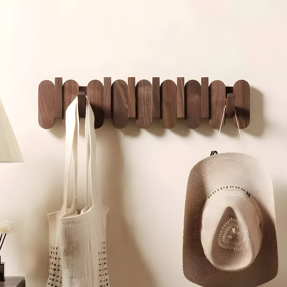 Wall coat rack walnut finish on white background showing hook design