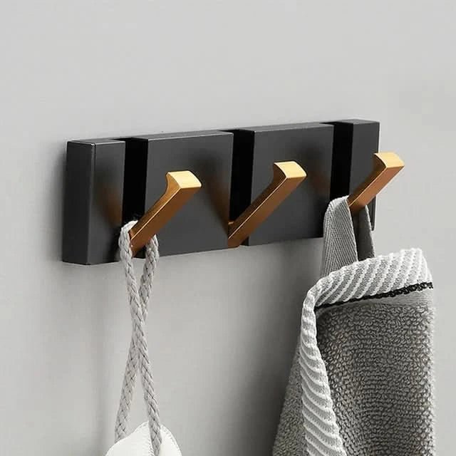 Three-hook aluminium wall hook rail black gold finish studio white background front view product shot