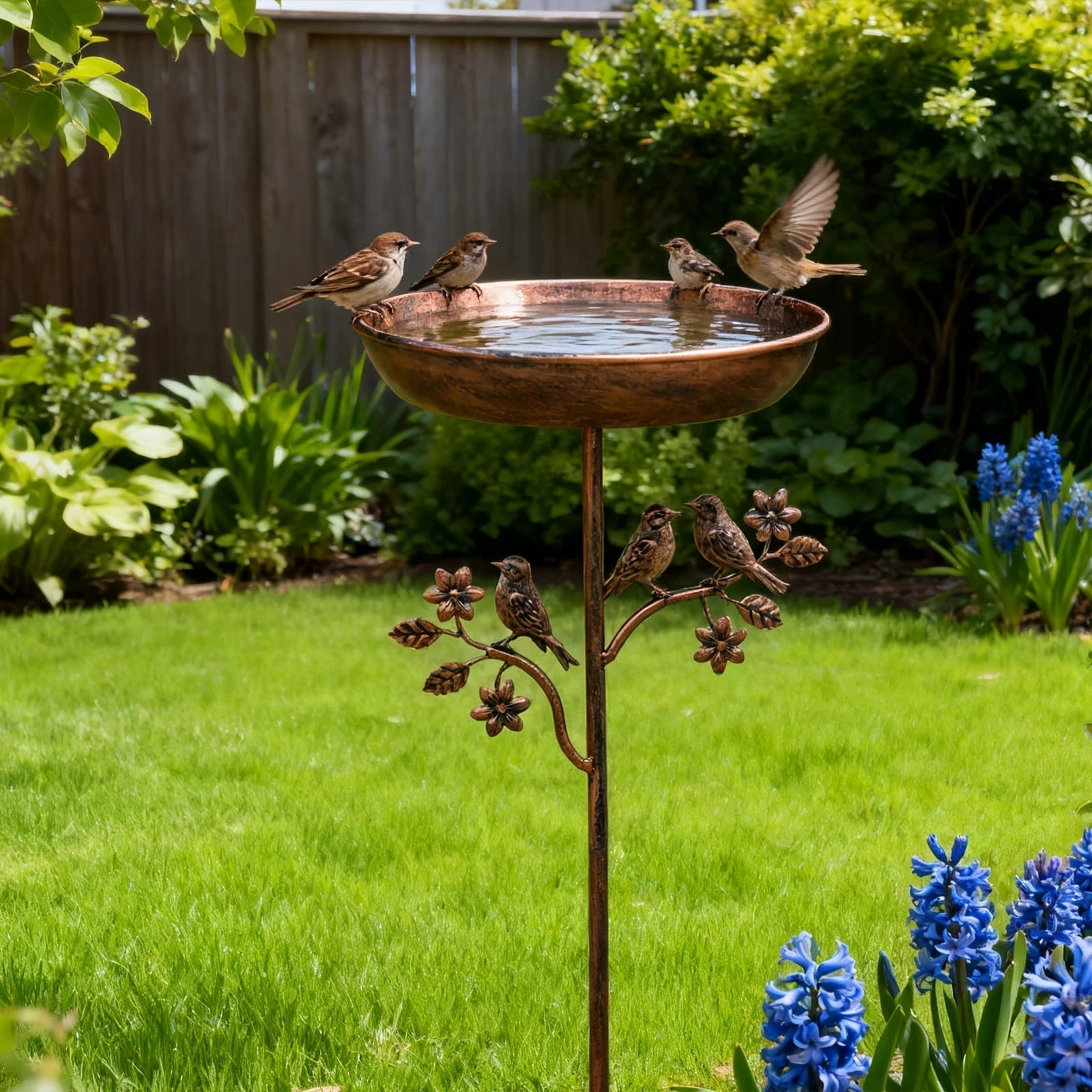 Garden Bird Bath with Stand — Metal Copper Finish in lifestyle setting