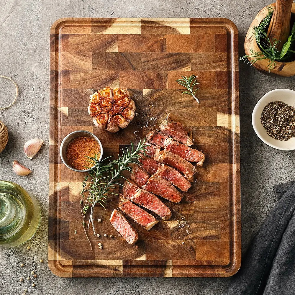 Acacia wood cutting board product view on white background displaying natural wood grain