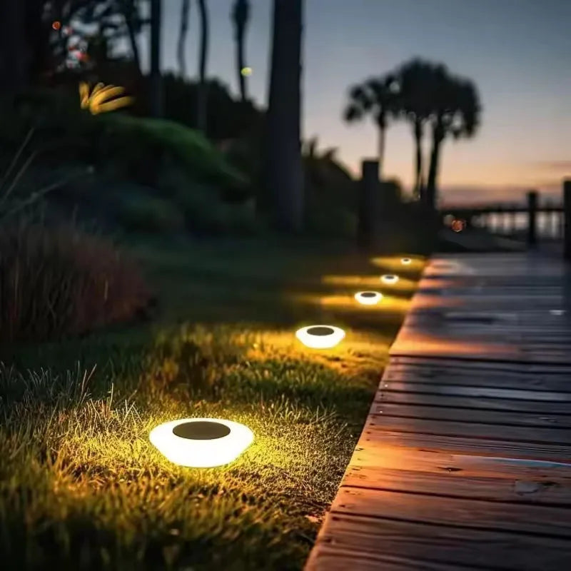 Solar pathway lights white ABS construction solar panel top view studio background product shot