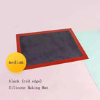 Black silicone non-stick mesh baking mat 30x40 cm with red edge on white background, flat lay product shot