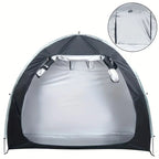 Front view of waterproof polyester bike storage tent open showing silver interior and arch frame poles