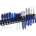 Wall-mounted 14-slot black metal tool holder with screwdrivers and pliers stored upright in each slot, workshop setting