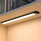 Silver motion sensor LED light 30 cm length on white background studio photography