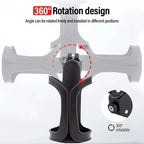 Black bicycle water bottle cage mounted on handlebar with water bottle inserted, viewed from the side outdoors