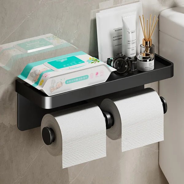Hand placing smartphone on toilet paper holder shelf contemporary bathroom setting