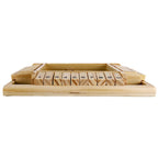 Family playing Shut the Box wooden board game at dining table in Australian home lounge room with natural daylight