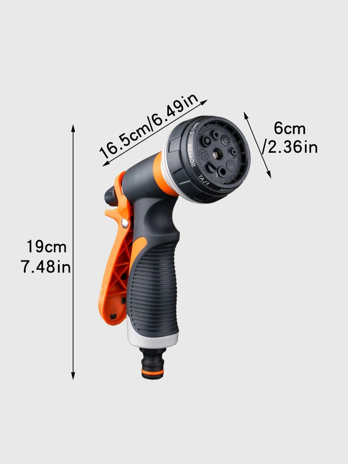 Garden spray gun orange black rubber grip ABS plastic construction studio white background