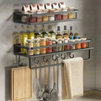 Wall-mounted kitchen storage shelf in modern kitchen with oils and cooking utensils organised