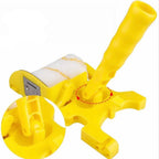 Person using paint roller edger at floor level along skirting board in bright interior room, no tape required