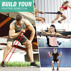Man performing assisted pull-up using purple resistance band on horizontal bar in a modern indoor gym