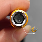 Person using flexible drill bit extension to drive screw inside tight wooden cabinet corner, workshop setting