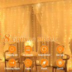 Solar string curtain lights 300 LEDs hanging as light curtain on outdoor entertaining area fence warm white glow