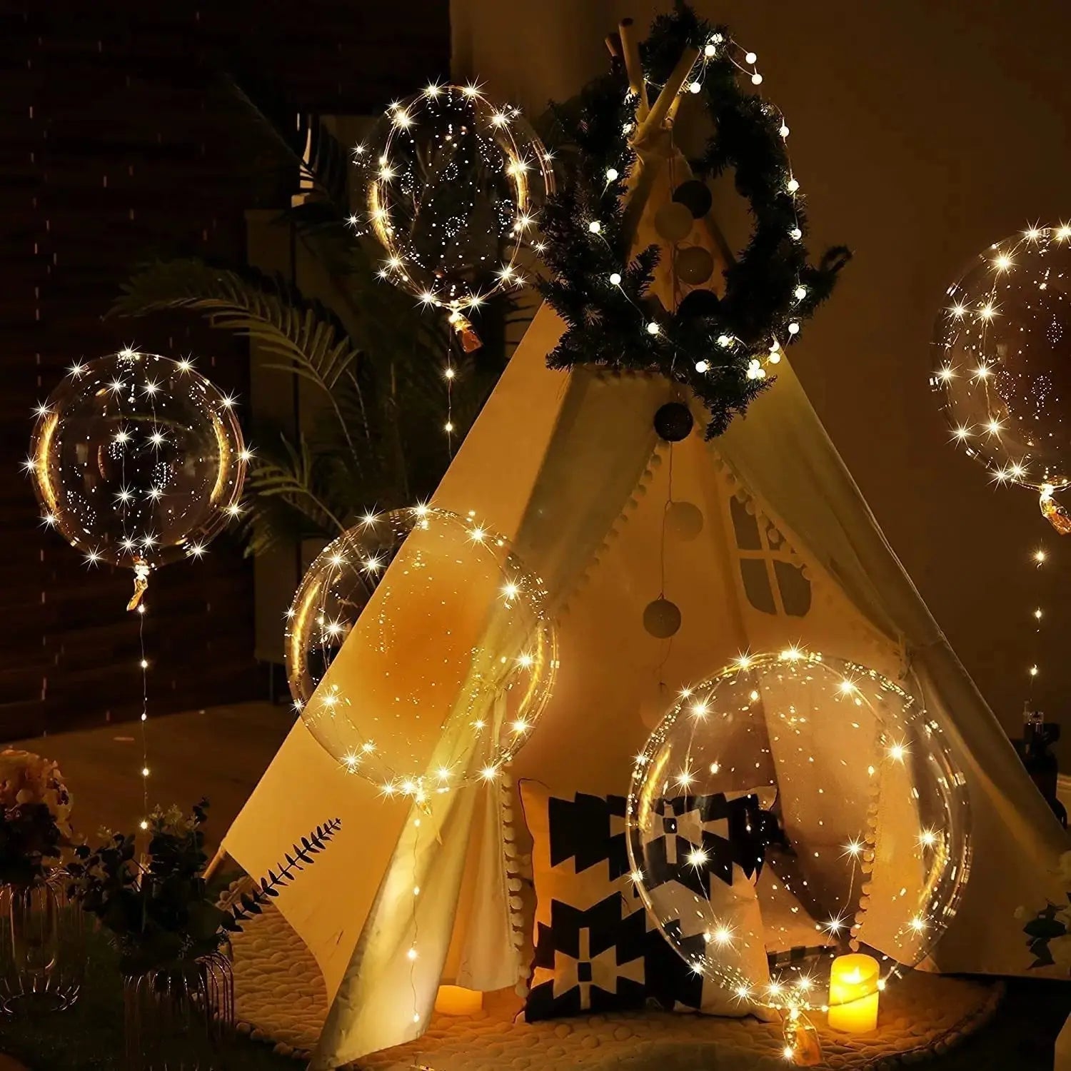 Close-up view of warm white LED light string positioned inside transparent latex-free balloon
