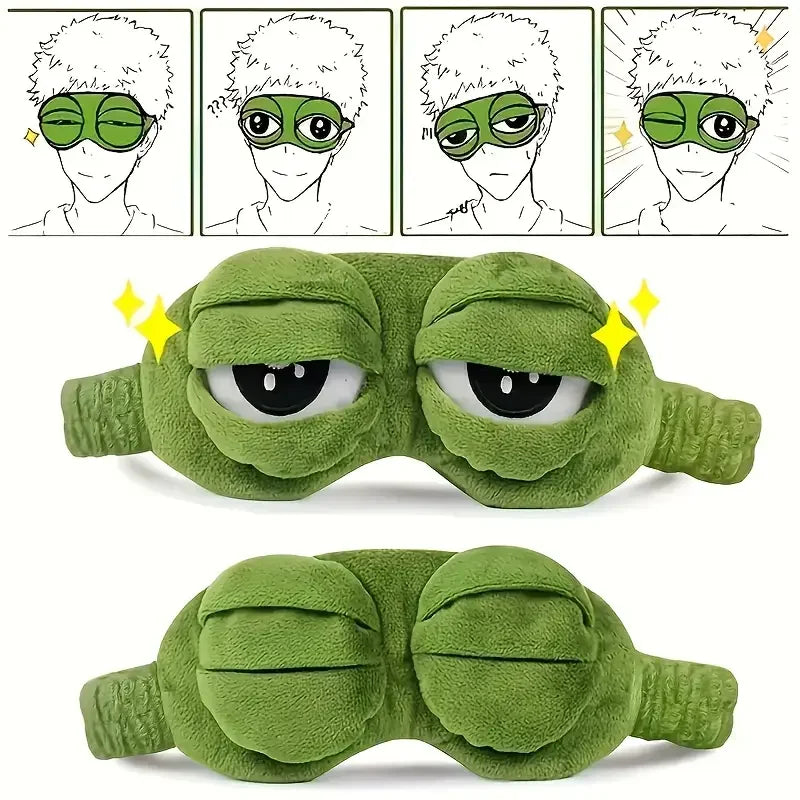 Two green frog eye sleep masks laid side by side on white linen surface showing pack of 2 contents