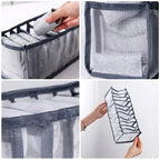 Open wardrobe drawer fitted with grey mesh organisers holding underwear and socks neatly upright in individual slots