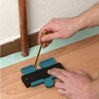 Three contour gauge tools in blue red and green colours on wooden workbench