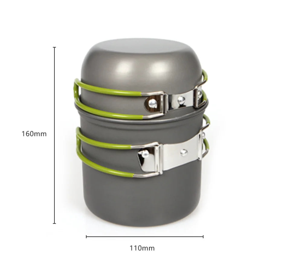 Close-up of anodised camping pot interior and stainless steel folding handle bracket with green silicone grip