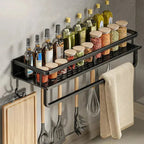 Close-up detail of aluminium kitchen shelf showing hook design and black finish