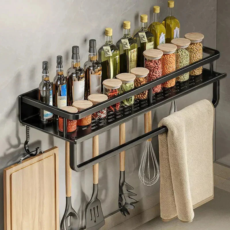 Close-up detail of aluminium kitchen shelf showing hook design and black finish