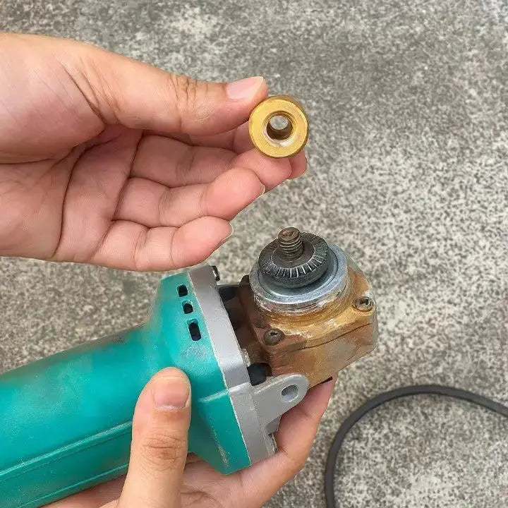 Hand holding diamond grinding disc displaying M10 bore hole and curved R0.4 radius edge