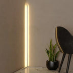 Corner floor lamp base detail showing aluminium construction and USB power connection