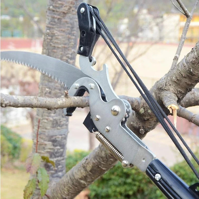 Close-up detail of curved bypass blade and coil spring mechanism on metal branch pruner head