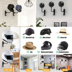 Close-up of 180-degree swivel joint mechanism on matte black wall-mount helmet holder