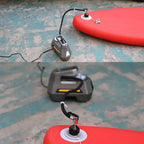 Detail of tethered valve caps and cord on SUP pump adapter kit keeping all small parts connected